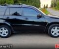 Чорний Тойота РАВ 4, об'ємом двигуна 2 л та пробігом 240 тис. км за 6299 $, фото 2 на Automoto.ua