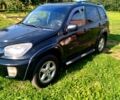 Чорний Тойота РАВ 4, об'ємом двигуна 2 л та пробігом 228 тис. км за 7000 $, фото 2 на Automoto.ua
