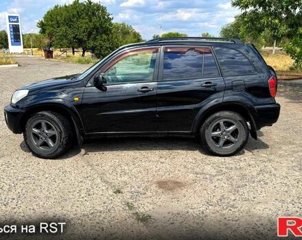Черный Тойота РАВ 4, объемом двигателя 2 л и пробегом 250 тыс. км за 4650 $, фото 2 на Automoto.ua