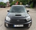 Черный Тойота РАВ 4, объемом двигателя 2 л и пробегом 276 тыс. км за 4900 $, фото 1 на Automoto.ua