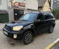 Черный Тойота РАВ 4, объемом двигателя 2 л и пробегом 400 тыс. км за 4000 $, фото 1 на Automoto.ua