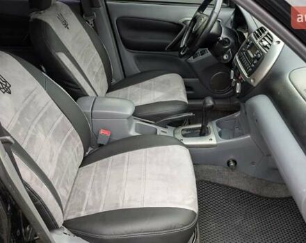 Черный Тойота РАВ 4, объемом двигателя 2 л и пробегом 406 тыс. км за 6000 $, фото 6 на Automoto.ua