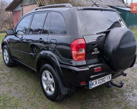 Черный Тойота РАВ 4, объемом двигателя 2 л и пробегом 406 тыс. км за 6000 $, фото 1 на Automoto.ua