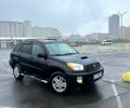 Черный Тойота РАВ 4, объемом двигателя 2 л и пробегом 225 тыс. км за 6350 $, фото 1 на Automoto.ua