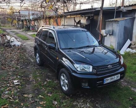 Чорний Тойота РАВ 4, об'ємом двигуна 2 л та пробігом 270 тис. км за 6500 $, фото 1 на Automoto.ua