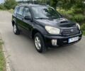 Черный Тойота РАВ 4, объемом двигателя 2 л и пробегом 337 тыс. км за 3200 $, фото 1 на Automoto.ua