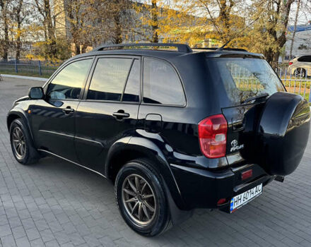 Черный Тойота РАВ 4, объемом двигателя 2 л и пробегом 479 тыс. км за 6000 $, фото 2 на Automoto.ua