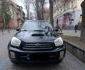 Черный Тойота РАВ 4, объемом двигателя 2 л и пробегом 303 тыс. км за 3800 $, фото 1 на Automoto.ua