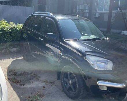 Черный Тойота РАВ 4, объемом двигателя 2 л и пробегом 360 тыс. км за 6000 $, фото 1 на Automoto.ua