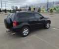 Чорний Тойота РАВ 4, об'ємом двигуна 2 л та пробігом 270 тис. км за 6500 $, фото 4 на Automoto.ua
