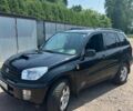 Черный Тойота РАВ 4, объемом двигателя 2 л и пробегом 200 тыс. км за 4320 $, фото 1 на Automoto.ua