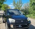 Черный Тойота РАВ 4, объемом двигателя 2 л и пробегом 315 тыс. км за 5900 $, фото 1 на Automoto.ua
