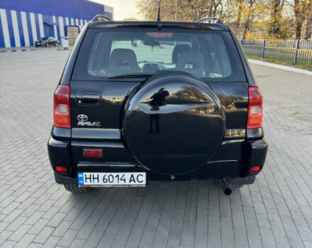 Черный Тойота РАВ 4, объемом двигателя 2 л и пробегом 479 тыс. км за 6000 $, фото 3 на Automoto.ua