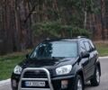 Черный Тойота РАВ 4, объемом двигателя 2 л и пробегом 300 тыс. км за 3800 $, фото 1 на Automoto.ua