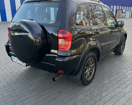 Черный Тойота РАВ 4, объемом двигателя 2 л и пробегом 479 тыс. км за 6000 $, фото 4 на Automoto.ua