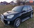 Черный Тойота РАВ 4, объемом двигателя 2 л и пробегом 318 тыс. км за 7000 $, фото 1 на Automoto.ua