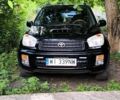 Чорний Тойота РАВ 4, об'ємом двигуна 2 л та пробігом 265 тис. км за 4500 $, фото 1 на Automoto.ua