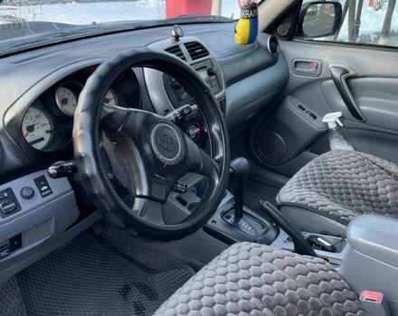 Черный Тойота РАВ 4, объемом двигателя 2 л и пробегом 217 тыс. км за 5400 $, фото 3 на Automoto.ua