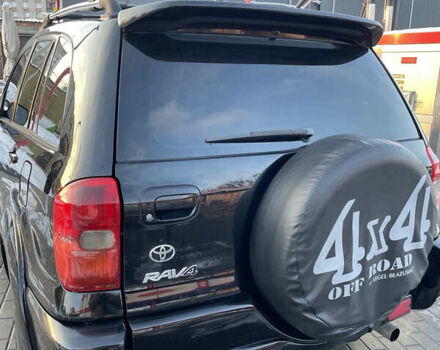 Черный Тойота РАВ 4, объемом двигателя 2 л и пробегом 217 тыс. км за 5800 $, фото 4 на Automoto.ua