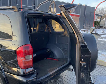 Черный Тойота РАВ 4, объемом двигателя 2 л и пробегом 217 тыс. км за 5800 $, фото 3 на Automoto.ua