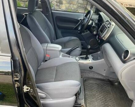 Черный Тойота РАВ 4, объемом двигателя 2 л и пробегом 160 тыс. км за 7000 $, фото 4 на Automoto.ua