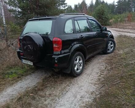 Чорний Тойота РАВ 4, об'ємом двигуна 2 л та пробігом 358 тис. км за 6800 $, фото 2 на Automoto.ua