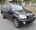 Черный Тойота РАВ 4, объемом двигателя 2 л и пробегом 240 тыс. км за 3700 $, фото 1 на Automoto.ua