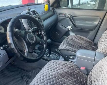 Черный Тойота РАВ 4, объемом двигателя 2 л и пробегом 330 тыс. км за 5400 $, фото 5 на Automoto.ua
