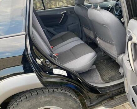 Черный Тойота РАВ 4, объемом двигателя 2 л и пробегом 160 тыс. км за 7000 $, фото 8 на Automoto.ua