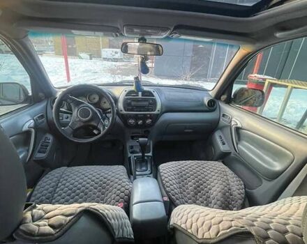 Черный Тойота РАВ 4, объемом двигателя 2 л и пробегом 330 тыс. км за 5400 $, фото 1 на Automoto.ua