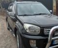 Черный Тойота РАВ 4, объемом двигателя 2 л и пробегом 285 тыс. км за 6000 $, фото 4 на Automoto.ua