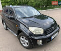 Чорний Тойота РАВ 4, об'ємом двигуна 2 л та пробігом 375 тис. км за 7400 $, фото 1 на Automoto.ua