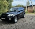 Черный Тойота РАВ 4, объемом двигателя 2 л и пробегом 255 тыс. км за 4500 $, фото 1 на Automoto.ua