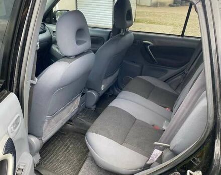 Черный Тойота РАВ 4, объемом двигателя 2 л и пробегом 160 тыс. км за 7000 $, фото 5 на Automoto.ua