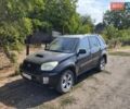 Черный Тойота РАВ 4, объемом двигателя 2 л и пробегом 300 тыс. км за 3500 $, фото 3 на Automoto.ua