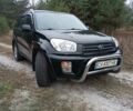 Чорний Тойота РАВ 4, об'ємом двигуна 2 л та пробігом 358 тис. км за 6800 $, фото 1 на Automoto.ua