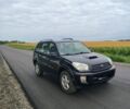 Черный Тойота РАВ 4, объемом двигателя 2 л и пробегом 300 тыс. км за 3800 $, фото 1 на Automoto.ua