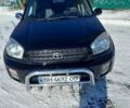 Чорний Тойота РАВ 4, об'ємом двигуна 2 л та пробігом 240 тис. км за 6700 $, фото 1 на Automoto.ua
