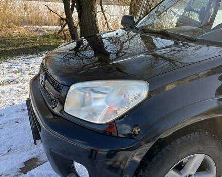 Черный Тойота РАВ 4, объемом двигателя 2 л и пробегом 305 тыс. км за 6500 $, фото 6 на Automoto.ua