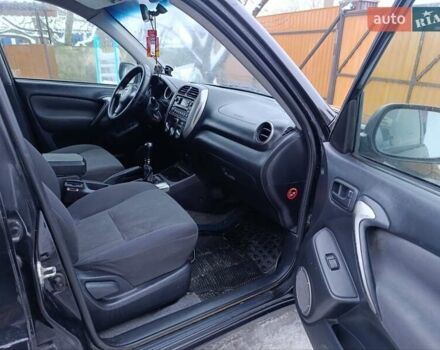 Черный Тойота РАВ 4, объемом двигателя 2 л и пробегом 253 тыс. км за 6000 $, фото 5 на Automoto.ua