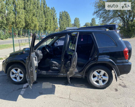 Черный Тойота РАВ 4, объемом двигателя 2 л и пробегом 262 тыс. км за 8800 $, фото 3 на Automoto.ua