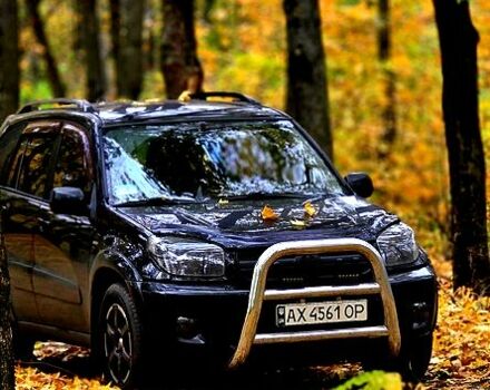 Черный Тойота РАВ 4, объемом двигателя 2 л и пробегом 224 тыс. км за 9000 $, фото 1 на Automoto.ua