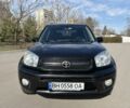 Чорний Тойота РАВ 4, об'ємом двигуна 2 л та пробігом 274 тис. км за 6750 $, фото 1 на Automoto.ua