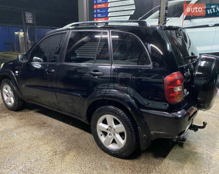 Черный Тойота РАВ 4, объемом двигателя 2 л и пробегом 269 тыс. км за 7500 $, фото 4 на Automoto.ua