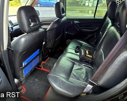 Черный Тойота РАВ 4, объемом двигателя 2 л и пробегом 224 тыс. км за 9000 $, фото 5 на Automoto.ua