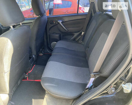 Черный Тойота РАВ 4, объемом двигателя 2 л и пробегом 262 тыс. км за 8800 $, фото 13 на Automoto.ua