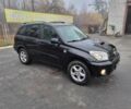 Черный Тойота РАВ 4, объемом двигателя 2 л и пробегом 275 тыс. км за 4800 $, фото 2 на Automoto.ua