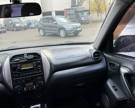 Черный Тойота РАВ 4, объемом двигателя 2 л и пробегом 230 тыс. км за 6500 $, фото 5 на Automoto.ua