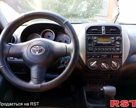 Чорний Тойота РАВ 4, об'ємом двигуна 2 л та пробігом 251 тис. км за 7100 $, фото 3 на Automoto.ua