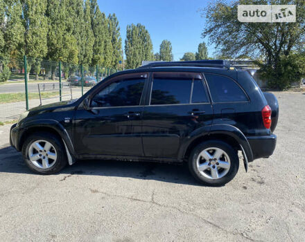 Черный Тойота РАВ 4, объемом двигателя 2 л и пробегом 262 тыс. км за 8800 $, фото 6 на Automoto.ua